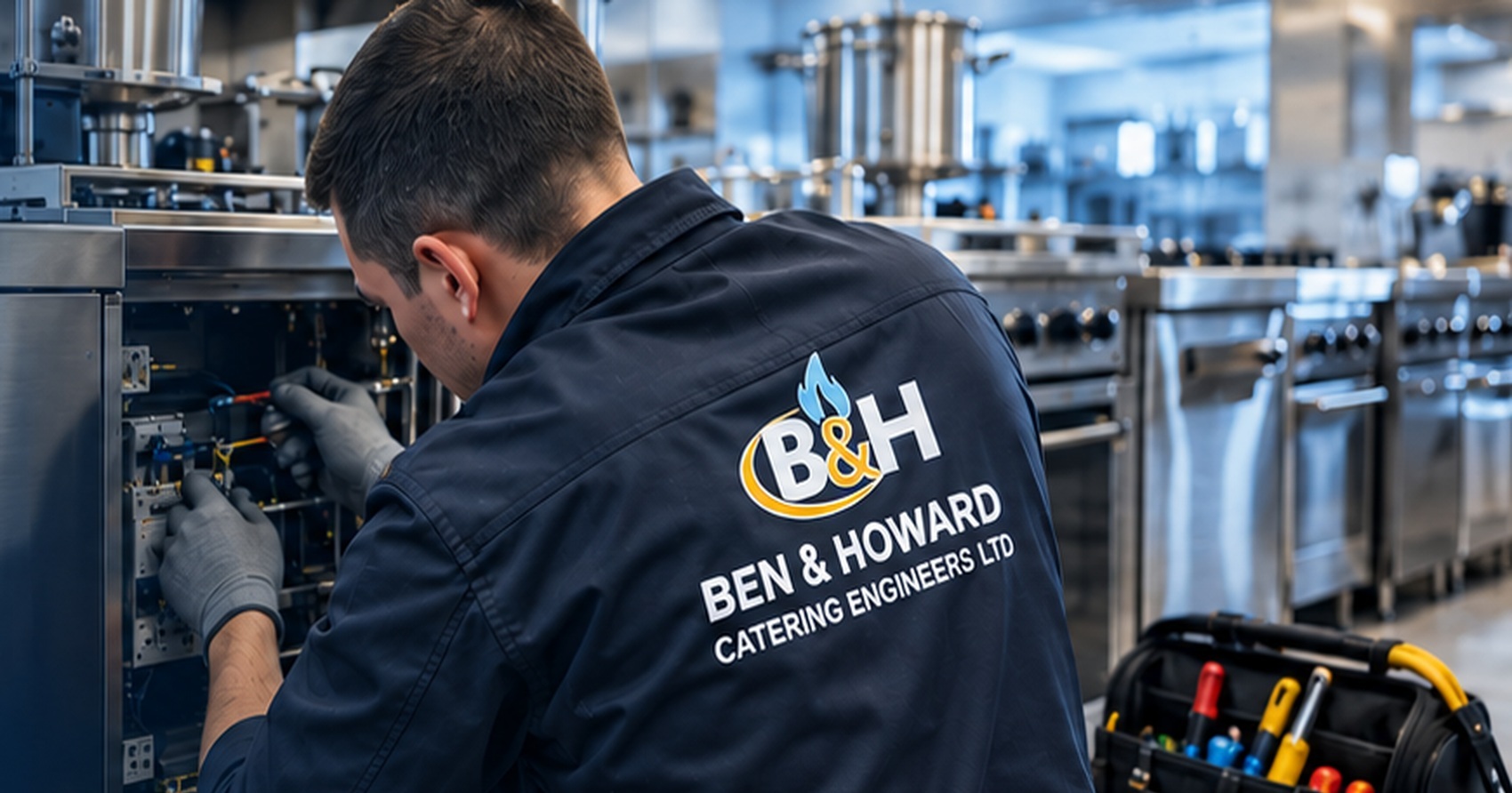 Engineer repairing commercial kitchen equipment